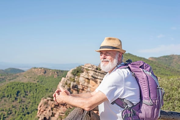 Man looking out at a valley