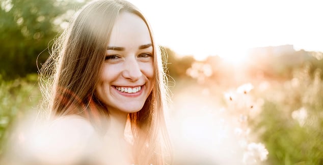 Smiling women in a field
